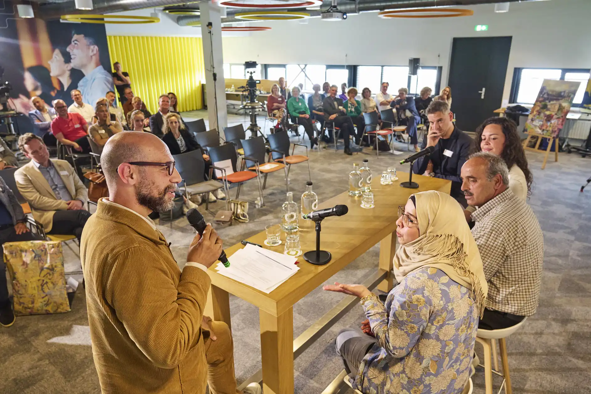 Abdelkader aan het woord tijden de bijeenkomst